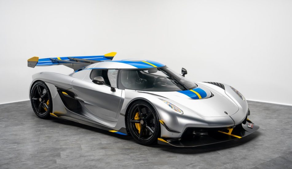 Koenigsegg Jesko Attack 2024 For Sale in Dubai Price: AED 15,850,000 Mileage: 4,532 km Specs: Euro Exterior: Moon Silver metallic, Swedish blue and yellow accents Interior: Full Desiato leather, bespoke stitching Engine: 5.0L V8 Gearbox: 9 speed LST Power: 1,600 hp Special: Power upgrade package, bespoke Swedish theme Overview This Jesko Attack is one of the most exclusive hypercars with extreme track focused engineering. The 5.0 twin turbo V8 pushes 1,600 hp with fast shifting through a Koenigsegg LST transmission. Handling is sharp and responsive. Aerodynamics are optimized for downforce, with a large carbon wing, advanced aero channels and lightweight construction. Exterior is finished with a Moon Silver metallic body and Swedish theme striping. The cabin is fully covered in Desiato leather with blue and yellow detail touches. Screens are clean, controls are minimal, and seats hold firm during acceleration. Mileage is low at 4,532 km. This unit suits collectors and enthusiasts who want rarity and speed. A serious hypercar purchase for high value buyers.